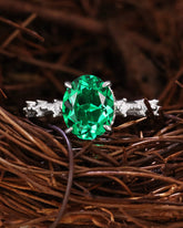 JADE Moissanite Accented Oval Cut Emerald Engagement Ring