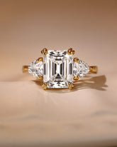 ARIELLE Three-Stone Emerald Cut Engagement Ring