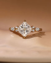 CLEO Three Stone Side Princess Cut Engagement Ring