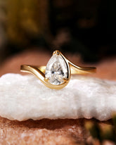 Philomela Sophisticated Bypass Claw Set Pear Solitaire Engagement Ring