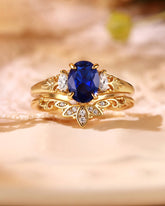 LILIOSA Oval Cut Sapphire Three Stone Lotus Inspired Engagement Ring Set 2pcs