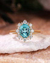 NERIDA Round Cut Alternating Sizes Moissanite Halo Oval Cut Paraiba Engagement Ring