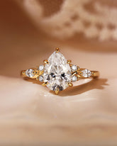 NADIA Three Stone Pear Cut Moissanite Twist Engagement Ring