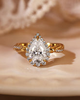 CLARISSA Halo Pear Cut Moissanite Flower Twist Engagement Ring