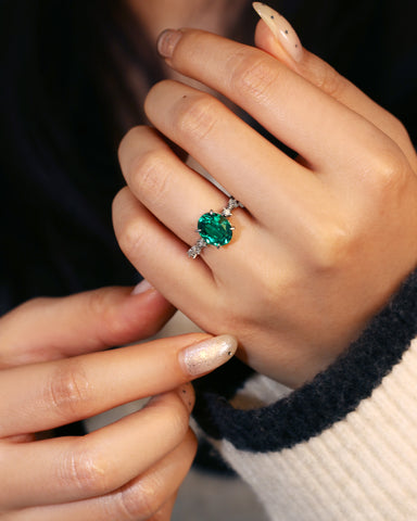 JADE Moissanite Accented Oval Cut Emerald Engagement Ring