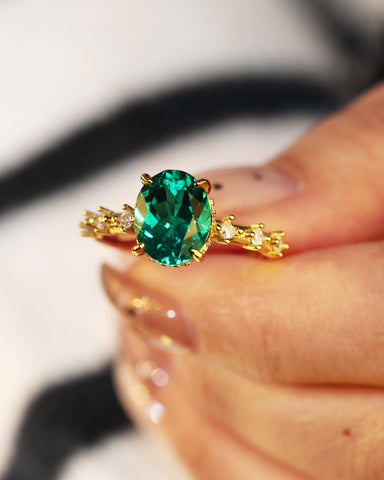 JADE Moissanite Accented Oval Cut Emerald Engagement Ring