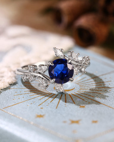 SYLVAINE Nature Inspired Round Cut Sapphire Bypass Leafy Engagement Ring