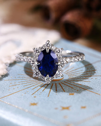 NEOMA  Classy Oval Cut Sapphire Halo Engagement Ring
