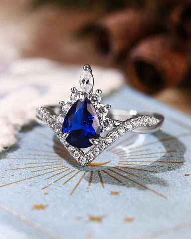 ISABELLA Halo Pear Cut Sapphire Twisted Engagement Ring