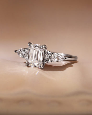 LEOLA Vintage Emerald Cut Engagement Ring with Three Side Stone