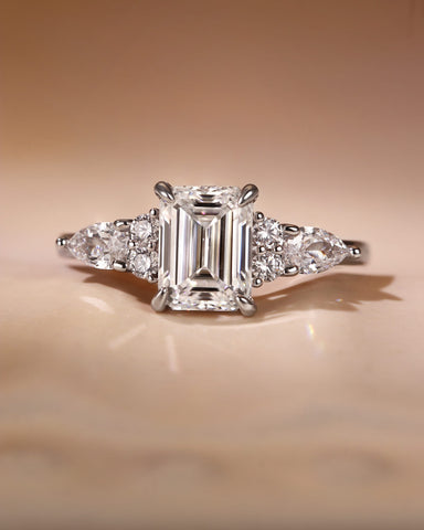 LEOLA Vintage Emerald Cut Engagement Ring with Three Side Stone