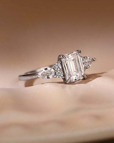 LEOLA Vintage Emerald Cut Engagement Ring with Three Side Stone
