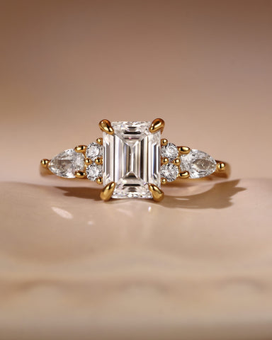 LEOLA Vintage Emerald Cut Engagement Ring with Three Side Stone