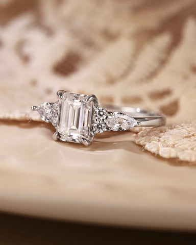 LEOLA Vintage Emerald Cut Engagement Ring with Three Side Stone