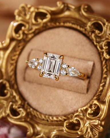 LEOLA Vintage Emerald Cut Engagement Ring with Three Side Stone