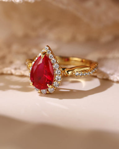 RUBINA Floral Twisted Halo Pear Shaped Ruby Engagement Ring