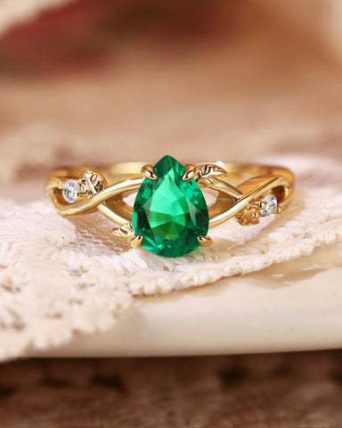 MABEL Nature Inspired Pear Cut Emerald Leaf Twist Engagement Ring