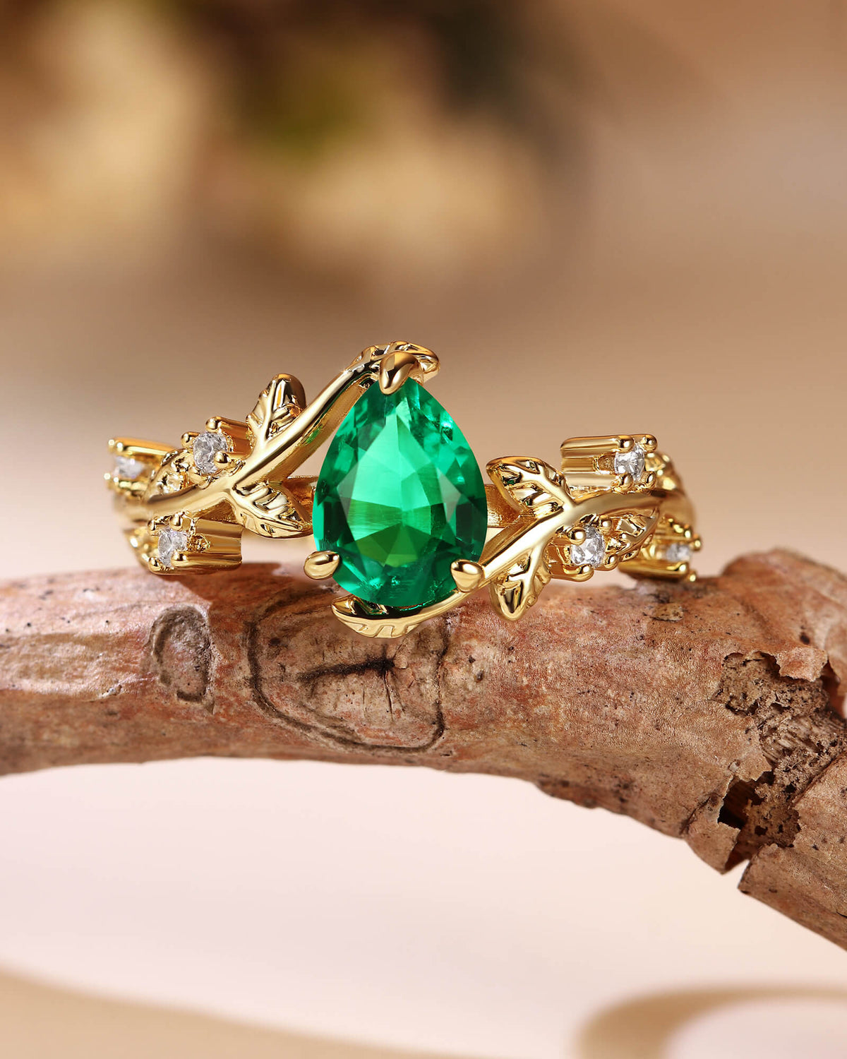 IVARA Nature Inspired Pear Cut Emerald Leafy Engagement Ring