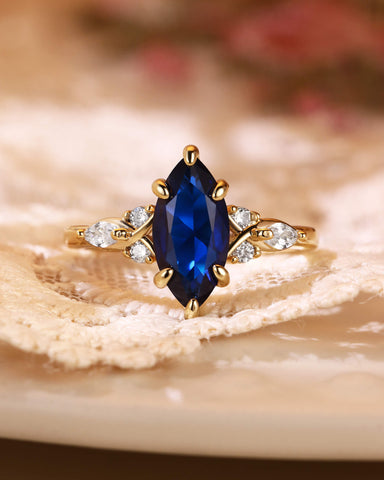SAPPHIRA Vintage Marquise Cut Blue Sapphire Twist Cluster Engagement Ring