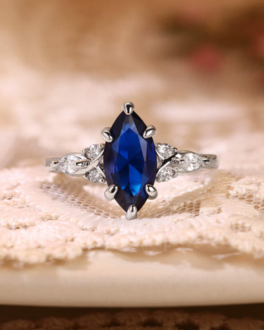 SAPPHIRA Vintage Marquise Cut Blue Sapphire Twist Cluster Engagement Ring