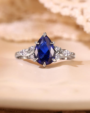 ELAIA Pear Cut Sapphire Twist Cluster Engagement Ring