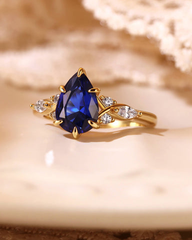ELAIA Pear Cut Sapphire Twist Cluster Engagement Ring