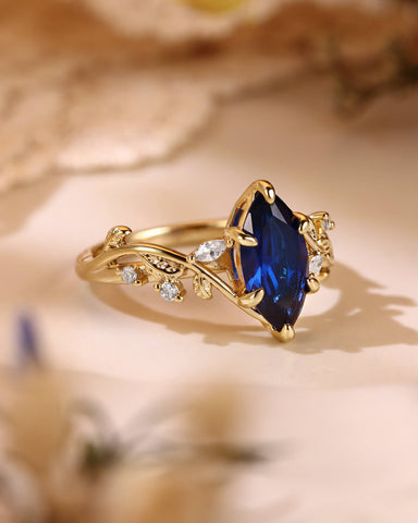ZARA Nature Inspired Marquise Cut Blue Sapphire Leafy Twist Engagement Ring