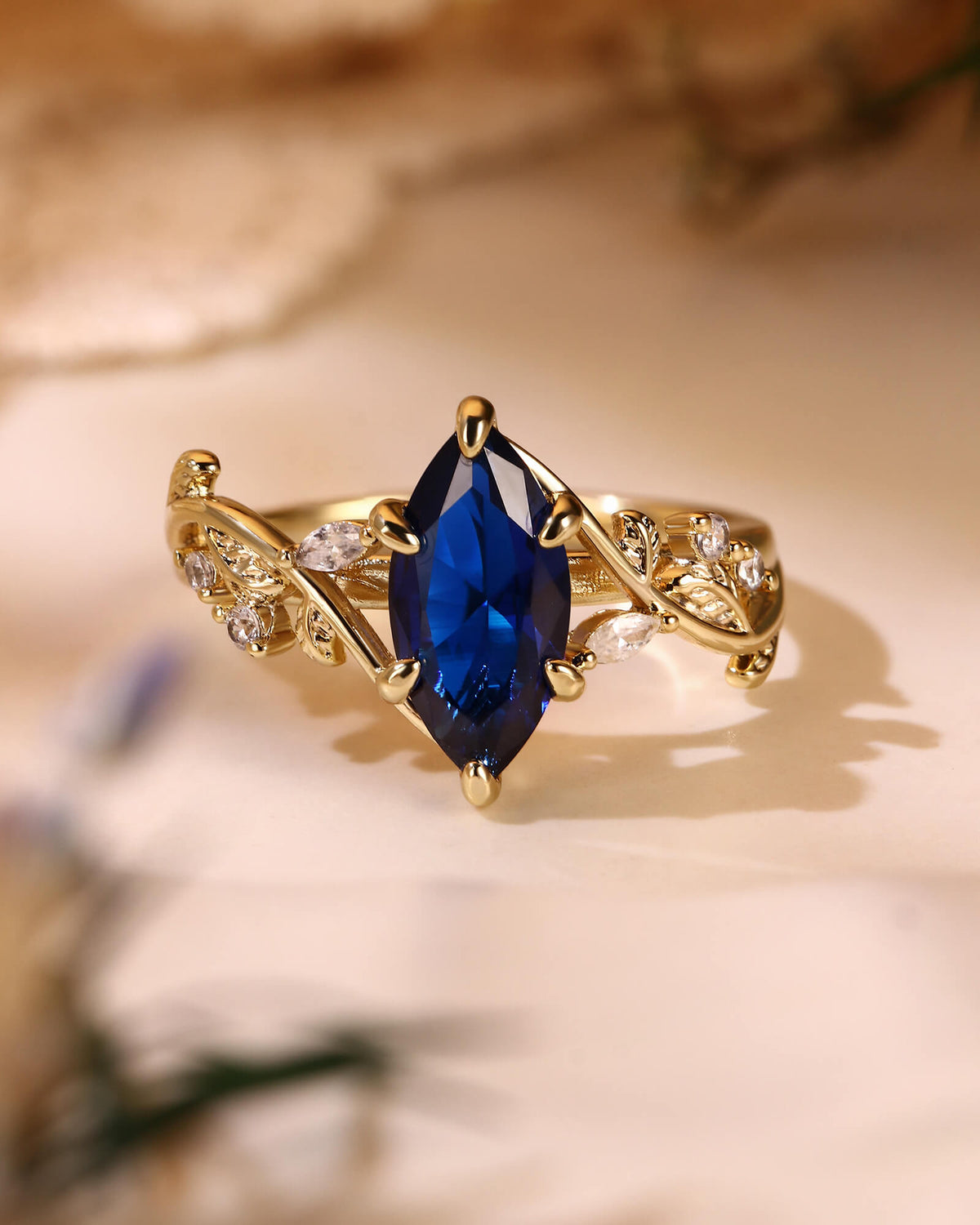 ZARA Nature Inspired Marquise Cut Blue Sapphire Leafy Twist Engagement Ring