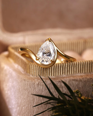 Philomela Sophisticated Bypass Claw Set Pear Solitaire Engagement Ring