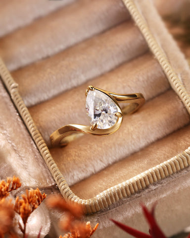 Philomela Sophisticated Bypass Claw Set Pear Solitaire Engagement Ring
