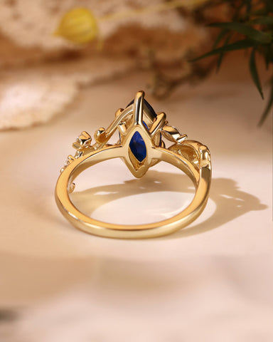 ZARA Nature Inspired Marquise Cut Blue Sapphire Leafy Twist Engagement Ring