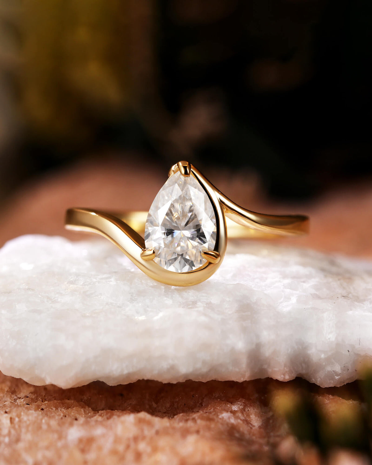 Philomela Sophisticated Bypass Claw Set Pear Solitaire Engagement Ring