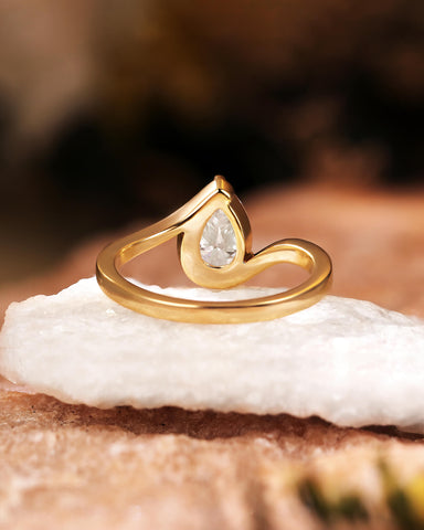 Philomela Sophisticated Bypass Claw Set Pear Solitaire Engagement Ring