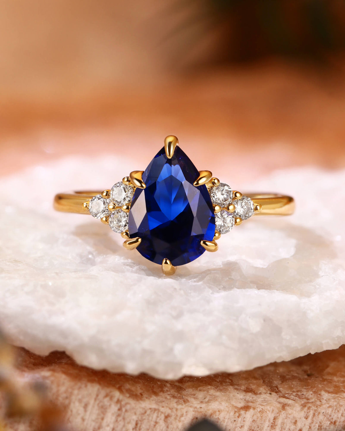 CYAN Pear Cut Blue Sapphire Cluster Engagement Ring