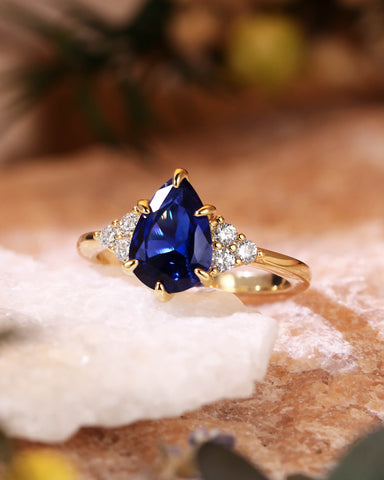 CYAN Pear Cut Blue Sapphire Cluster Engagement Ring