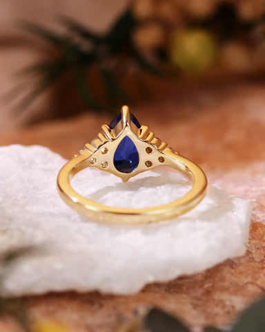 CYAN Pear Cut Blue Sapphire Cluster Engagement Ring