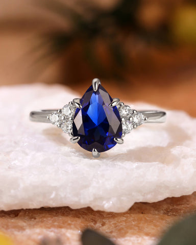 CYAN Pear Cut Blue Sapphire Cluster Engagement Ring