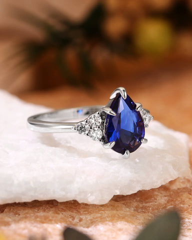 CYAN Pear Cut Blue Sapphire Cluster Engagement Ring