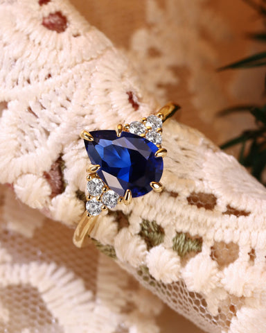 CYAN Pear Cut Blue Sapphire Cluster Engagement Ring