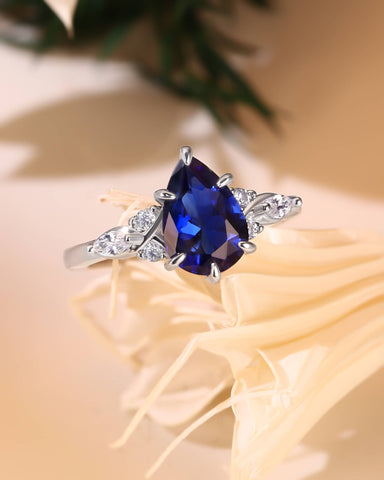 ELAIA Pear Cut Sapphire Twist Cluster Engagement Ring