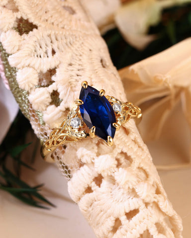 LUCILLE Marquise Cut Blue Sapphire Leaf & Knot Love Engagement Ring