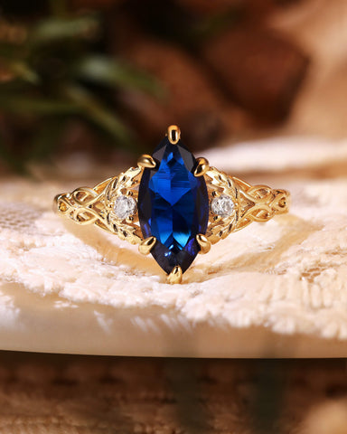 LUCILLE Marquise Cut Blue Sapphire Leaf & Knot Love Engagement Ring