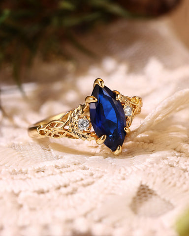 LUCILLE Marquise Cut Blue Sapphire Leaf & Knot Love Engagement Ring
