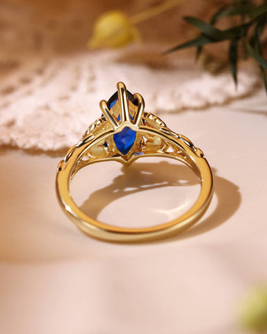 LUCILLE Marquise Cut Blue Sapphire Leaf & Knot Love Engagement Ring