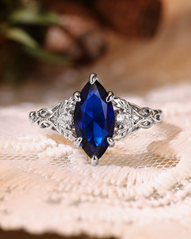 LUCILLE Marquise Cut Blue Sapphire Leaf & Knot Love Engagement Ring
