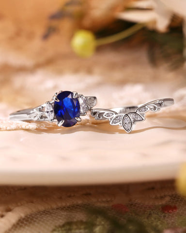 LILIOSA Oval Cut Sapphire Three Stone Lotus Inspired Engagement Ring Set 2pcs