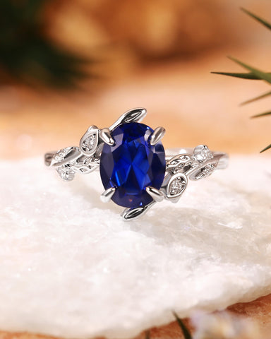 FLORENCE Oval Cut Blue Sapphire Flower & Leafy Engagement Ring