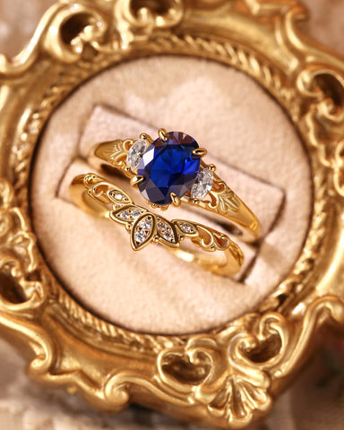 LILIOSA Oval Cut Sapphire Three Stone Lotus Inspired Engagement Ring Set 2pcs