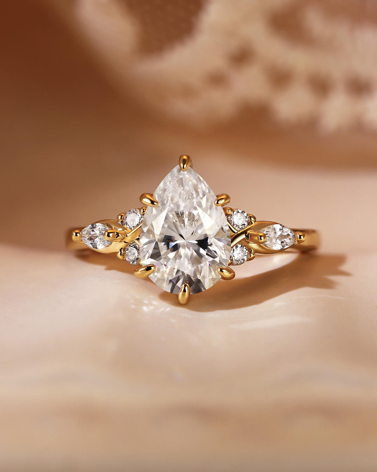 NADIA Three Stone Pear Cut Moissanite Twist Engagement Ring