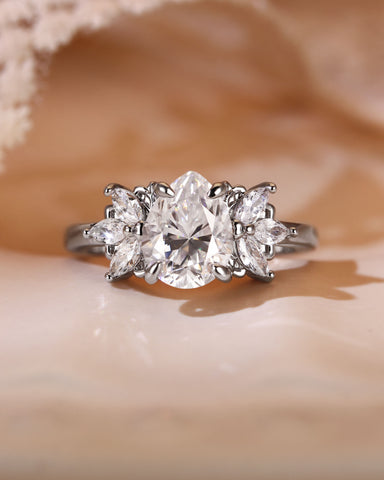 LUNE Pear Cut Moissanite Cluster Leafy Engagement Ring